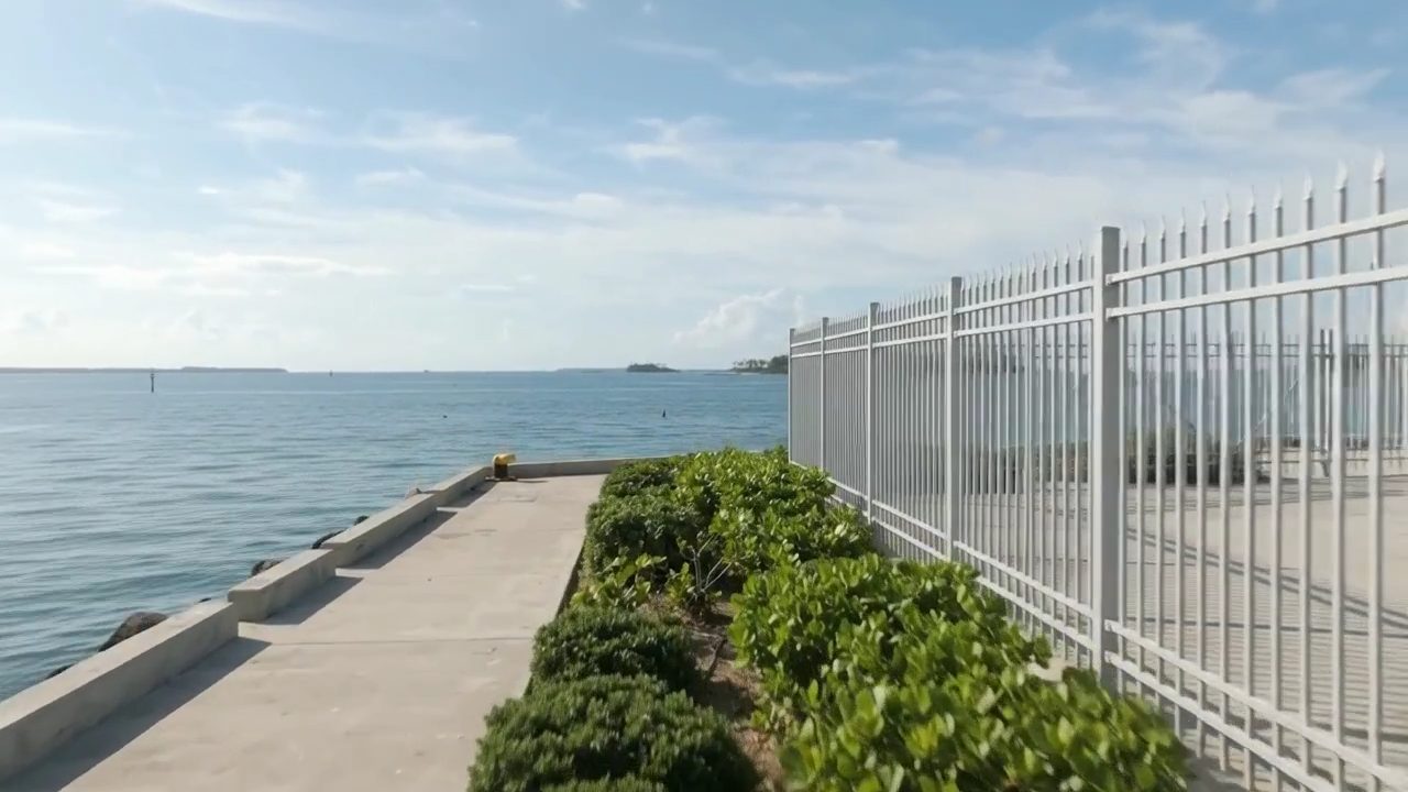 Aluminum fence along the waterfront at Nassau Cruise Port, Bahamas